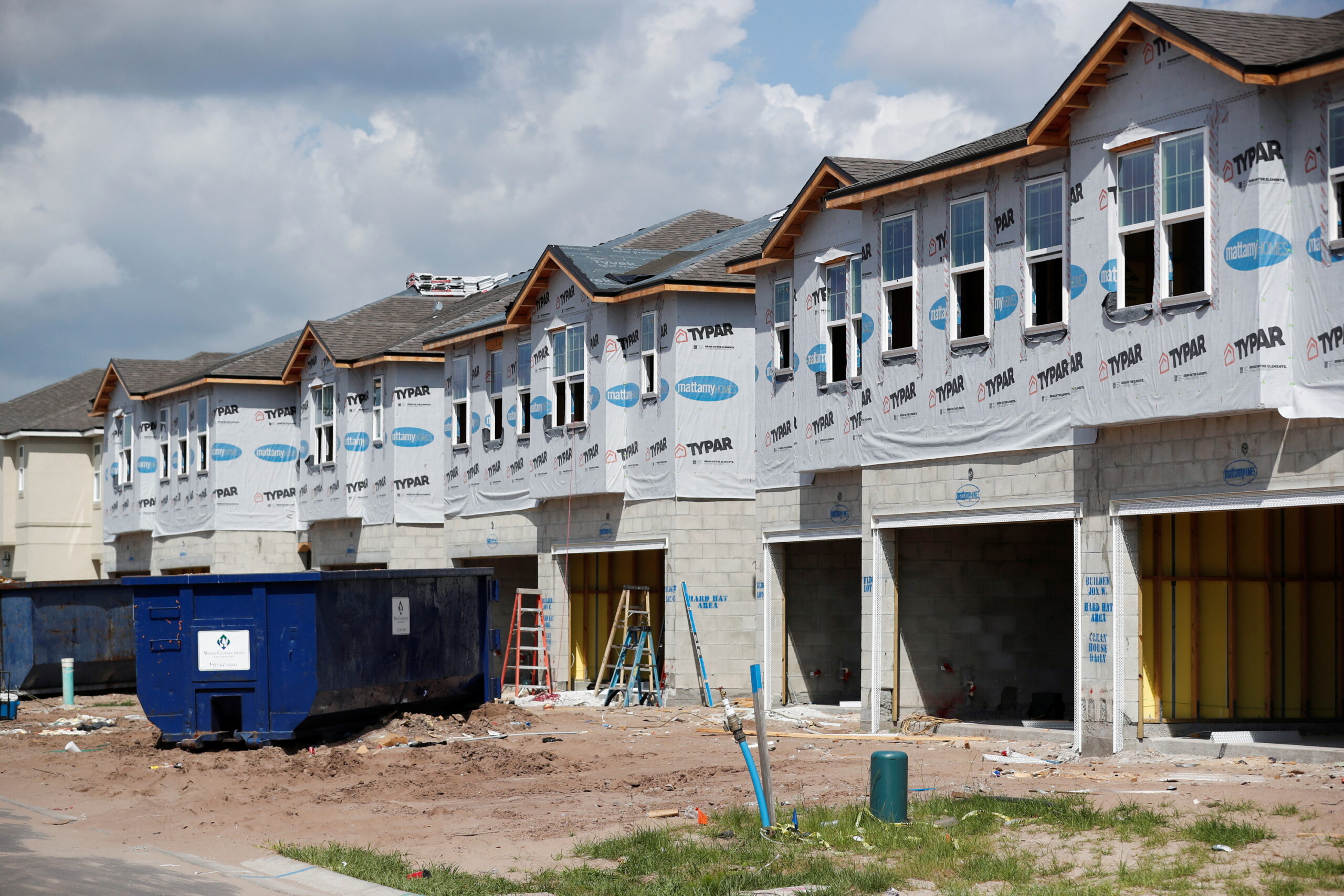 New townhomes are seen under construction while building material supplies are in high demand in Tampa